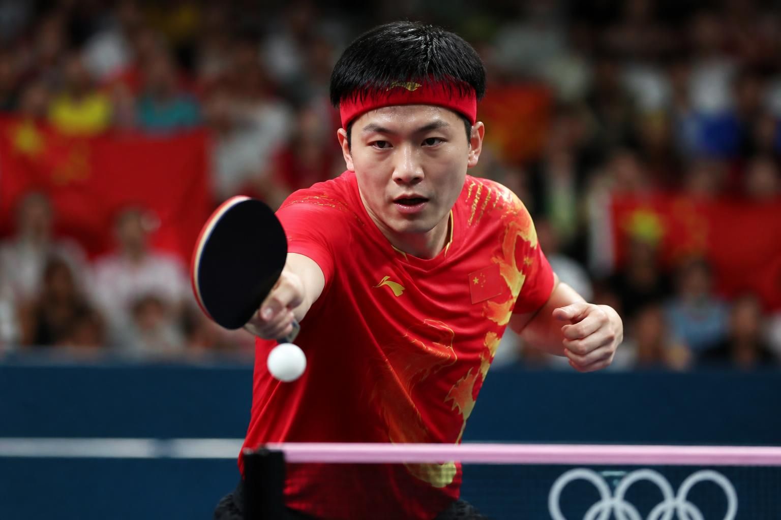 découvrez comment ma long, icône du tennis de table chinois, illumine les jeux olympiques par son talent exceptionnel et ses victoires mémorables.
